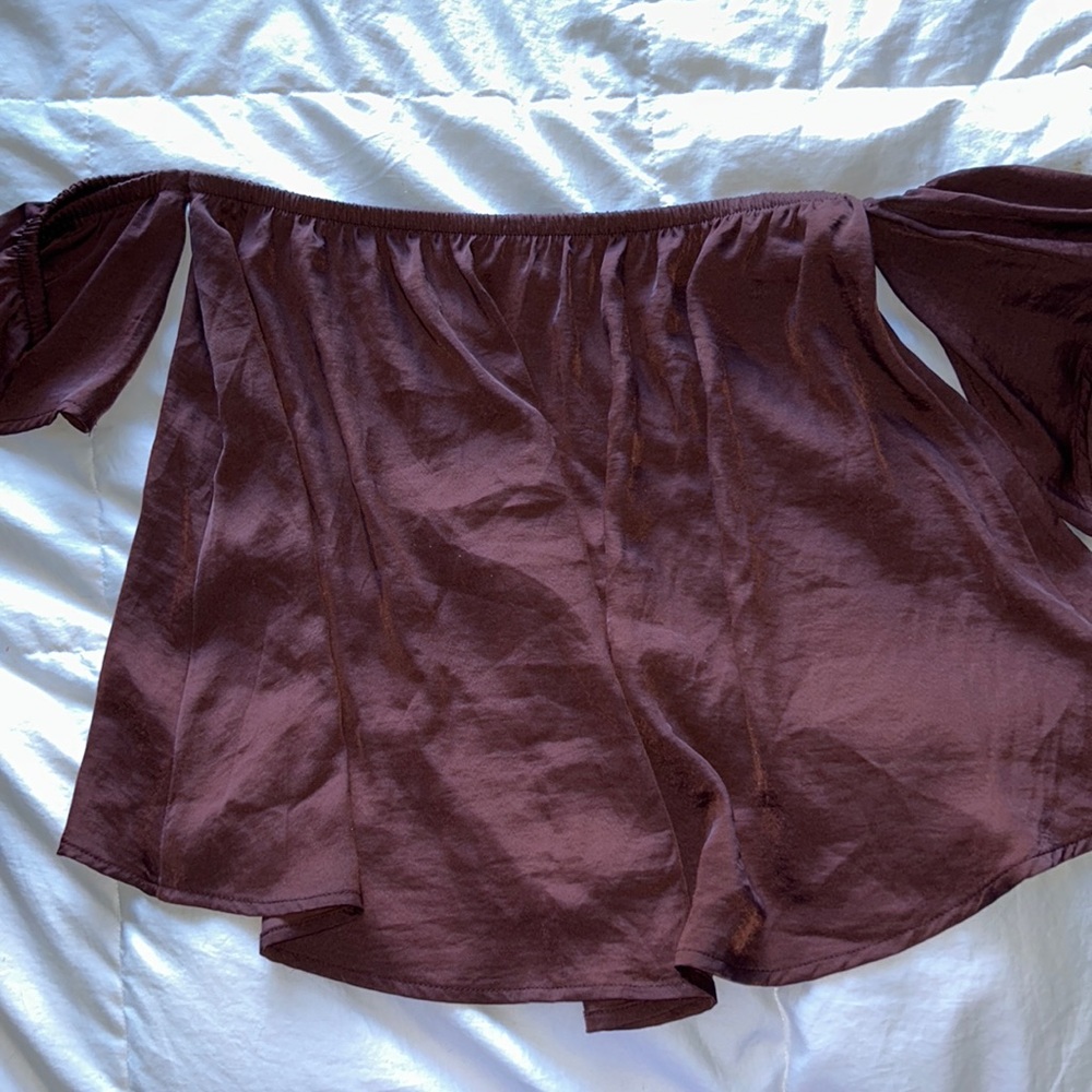 Off shoulder silk top.